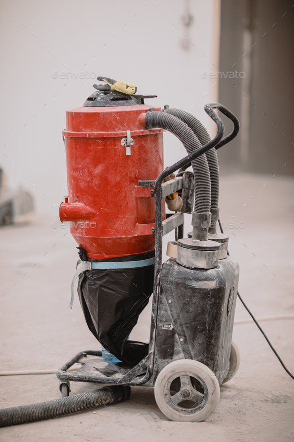 Industrial vacuum cleaner used on site attachable to the grinder Stock